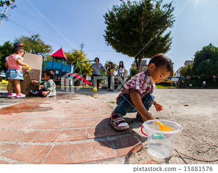 A friend group playing in the park A friend group playing in the park 15881576