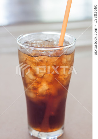 A glass of cola with ice A glass of cola with ice 15883660