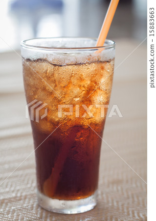 A glass of cola with ice 15883663