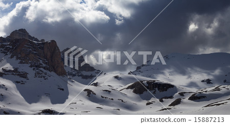 Panoramic view on snowy mountains in storm clouds Panoramic view on snowy mountains in storm clouds 15887213