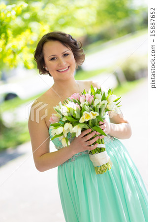 Happy bride with wedding bouquet. 15887652