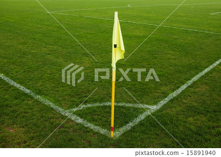 Yellow flag in corner of football playground 15891940