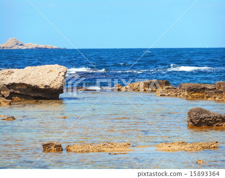 A view of a rocky shore of a Sicily island A view of a rocky shore of a Sicily island 15893364