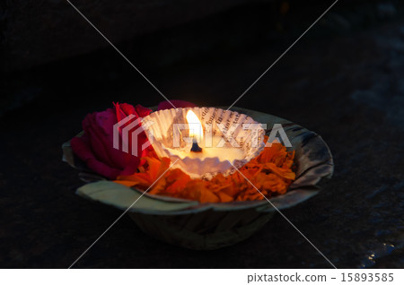 Flowers and candle for Ganga Aarti ritual Flowers and candle for Ganga Aarti ritual 15893585