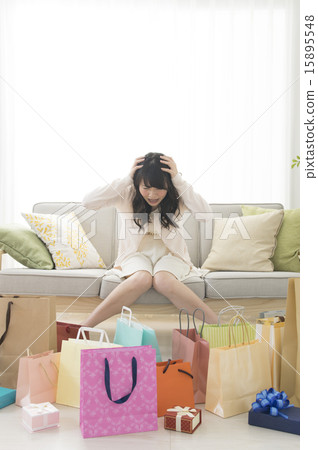 Shopping image A young woman shocked by shopping too much 15895548