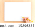 Pencils held in memos and hands (sideways) 15896285