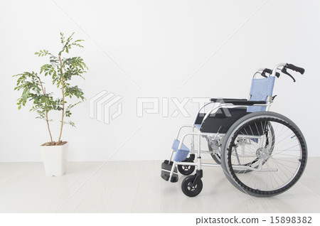 Wheelchair and foliage plant photography image of nursing care 15898382