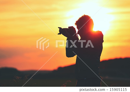 Silhouette of the photographer 15905115