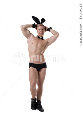 Image of strong macho posing in sexy bunny suit 15906931