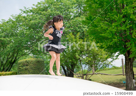 Girls playing in the park 15908499