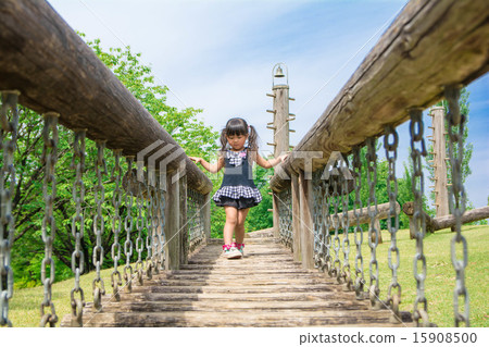Girls playing in the park 15908500