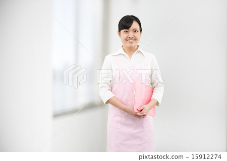Image of a young woman who stood on the window apron Image of a young woman who stood on the window apron 15912274