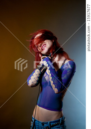 Woman listening music excited Woman listening music excited 15917677