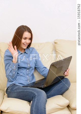Girl skyping on laptop. Girl skyping on laptop. 15918762