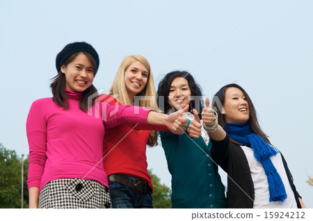 Thumbs up girls Thumbs up girls 15924212