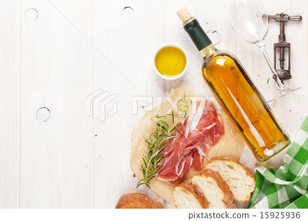 Prosciutto, wine, ciabatta, parmesan and olive oil Prosciutto, wine, ciabatta, parmesan and olive oil 15925936