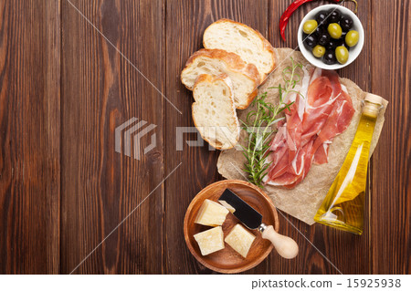 Bruschetta ingredients prosciutto, olives, cheese Bruschetta ingredients prosciutto, olives, cheese 15925938