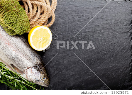 Fresh raw rainbow trout fish and spices Fresh raw rainbow trout fish and spices 15925971