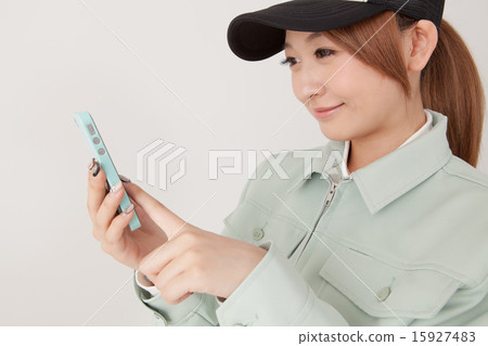 operate, work clothes, smart phone 15927483
