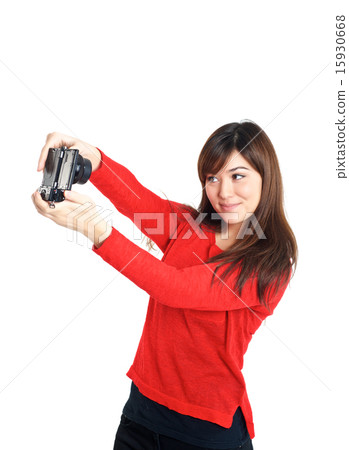 Asian girl taking a selfie with compact camera Asian girl taking a selfie with compact camera 15930668