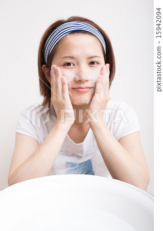 Women washing their face Women washing their face 15942094