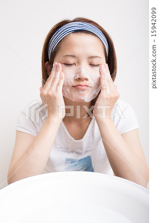 Women washing their face Women washing their face 15942099