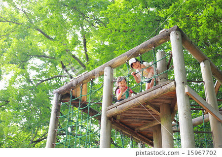 Elementary school students playing in nature 15967702