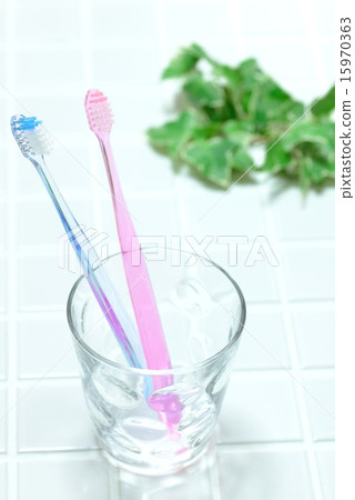Toothbrush on glass cup 15970363