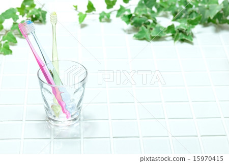Toothbrush on glass cup Toothbrush on glass cup 15970415