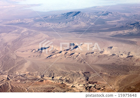 Natural modeling of the dried sandy ground of the highland desert in north South Chile, around Calama Natural modeling of the dried sandy ground of the highland desert in north South Chile, around Calama 15975648