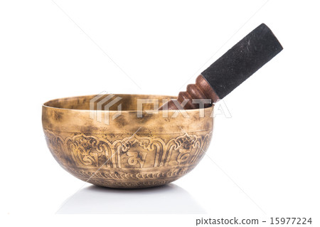 Nepali singing bowl isolated in white 15977224
