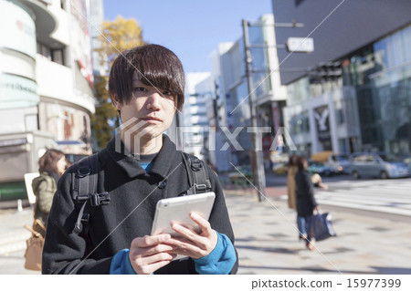 Young Men Tablet Camera Looking Young Men Tablet Camera Looking 15977399