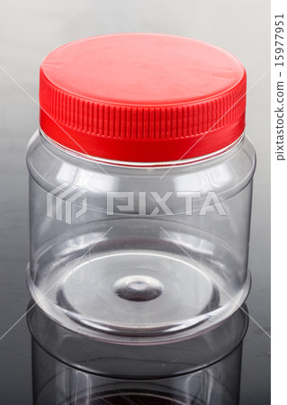Translucent plastic PVC jar with red cover Translucent plastic PVC jar with red cover 15977951