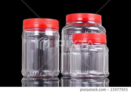 Translucent plastic PVC jar with red cover Translucent plastic PVC jar with red cover 15977955