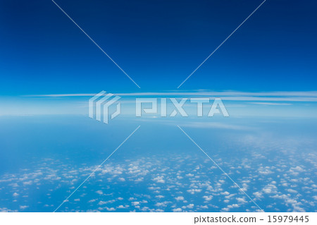 white fluffy clouds in the blue sky 15979445