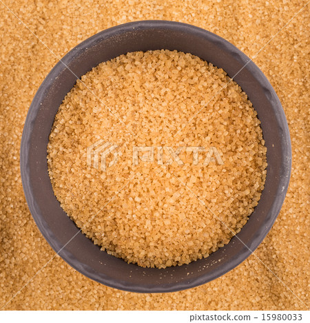 brown sugar in dark bowl 15980033