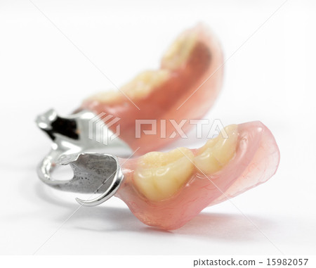 partial dental prosthetics on a white background 15982057