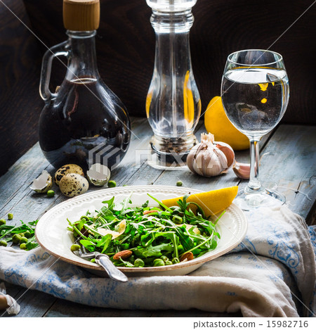 green salad with arugula, cheese, almonds, lemon green salad with arugula, cheese, almonds, lemon 15982716