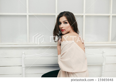 Beautiful emotional girl posing at the camera Beautiful emotional girl posing at the camera 15985648
