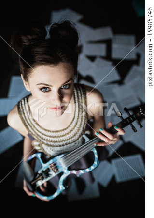 girl posing and holding a violin 15985746