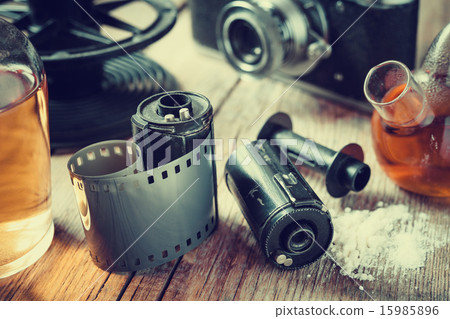 Old photo film rolls, cassette and retro camera Old photo film rolls, cassette and retro camera 15985896
