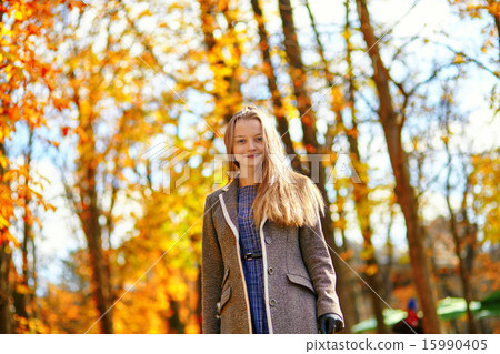 Young girl in Paris on a fall day Young girl in Paris on a fall day 15990405