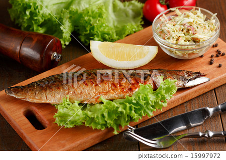 Fried mackerel with slice of lemon and lettuce 15997972