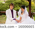 Couple love bride and groom posing sitting on wood 16006665