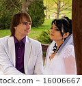 Couple love bride and groom posing sitting on wood 16006667