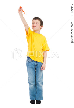 boy in yellow shirt writes marker boy in yellow shirt writes marker 16009947