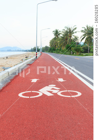 Bicycle lane or path, on red asphalt road 16028285