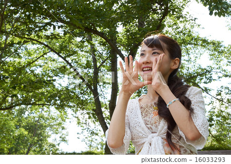 A girl calling with both hands A girl calling with both hands 16033293