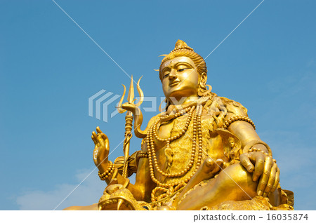 Statue of Lord Shiva with blue sky background 16035874