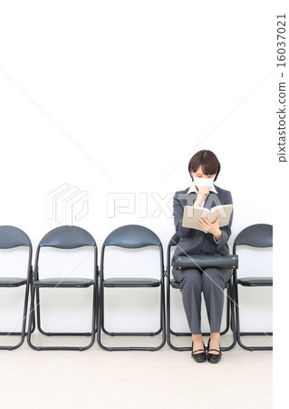 A woman waiting for turns 16037021